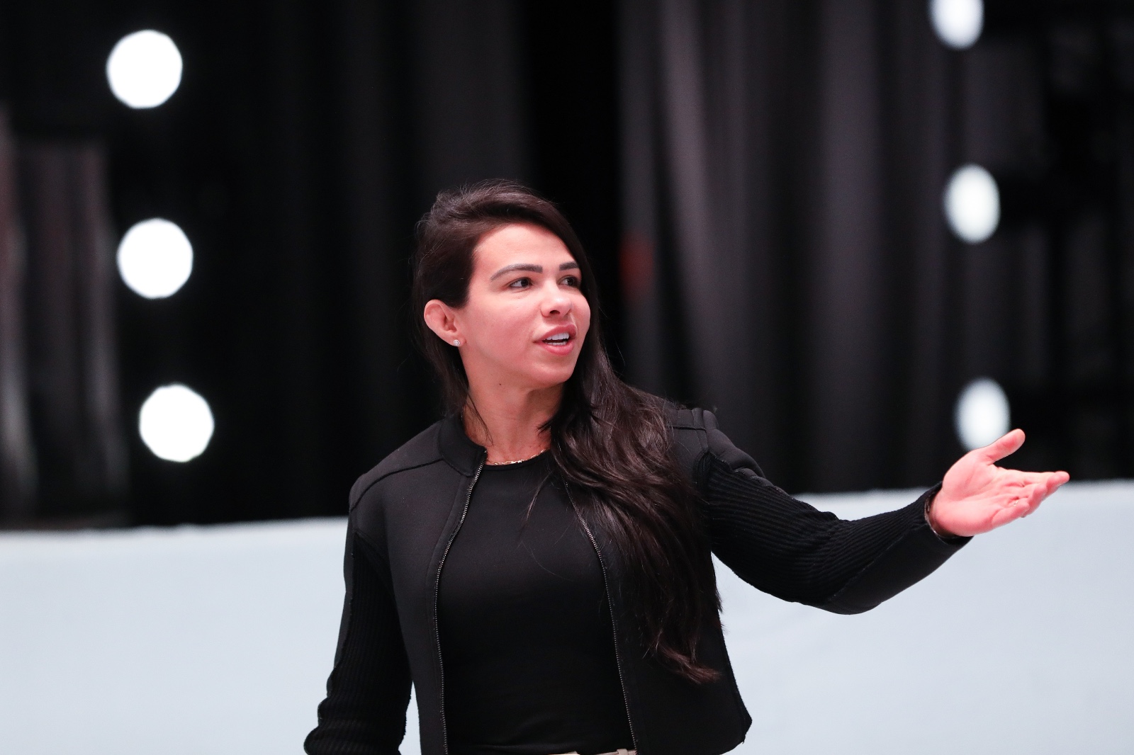 Claudia presenting and speaking